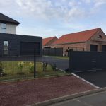 Entrée de garage en enrobé macadam par ABC Paysage dans le Nord Pas de Calais près de lille