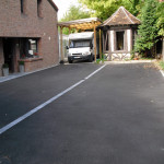 Entrée de garage en enrobé macadam par ABC Paysage dans le Nord Pas de Calais près de lille
